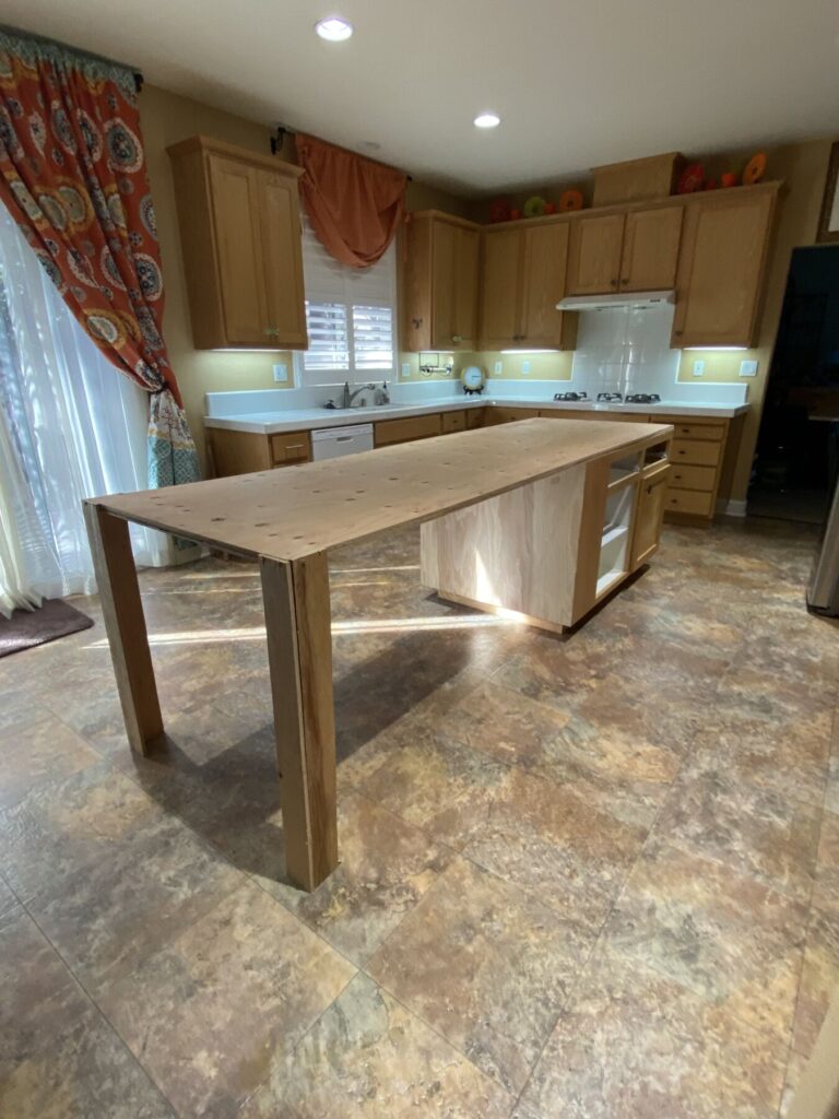 Wood Top underlayment added, and open shelving closed off